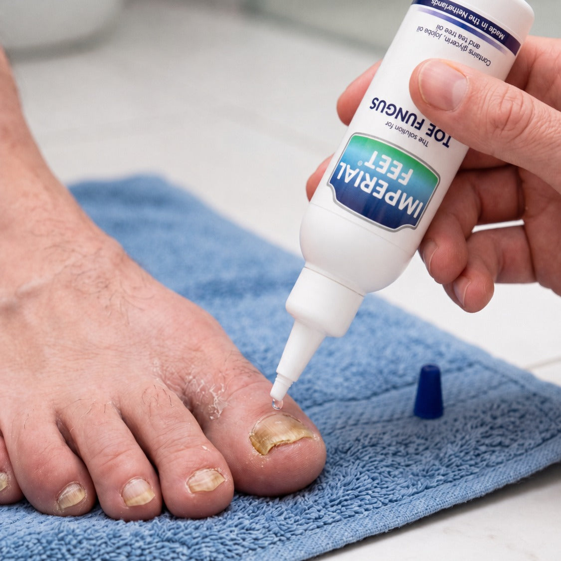 Applying drops to the toenail without the bottle touching it