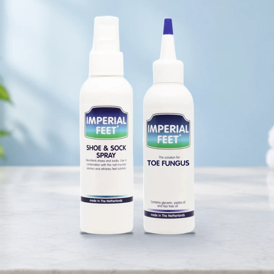 The Toe Fungus solution and the Shoe & Sock Spray on a bathroom counter